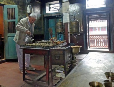 Making butter lamps, Hiranya Varna Mahavihar, Patan